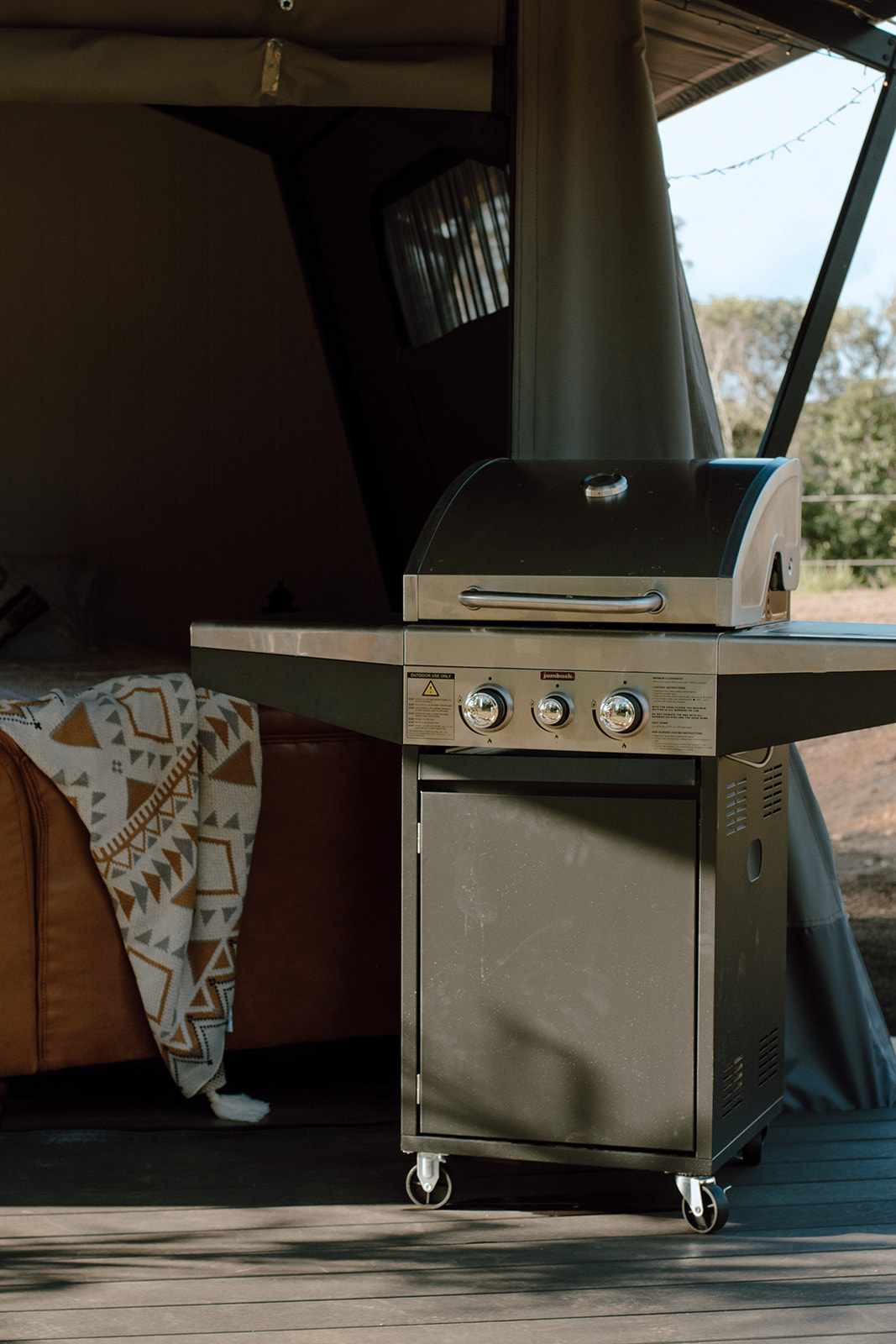 1-family-retreats-hitching-rail-retreat-bottlebrush-glamping-tent-bbq